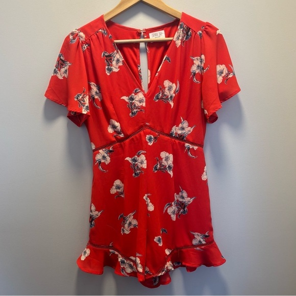 Sienna Sky Floral Romper | Short Flutter
Sleeve Romper - Picture 2 of 8